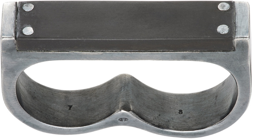 Parts of Four Black Plate Double Ring