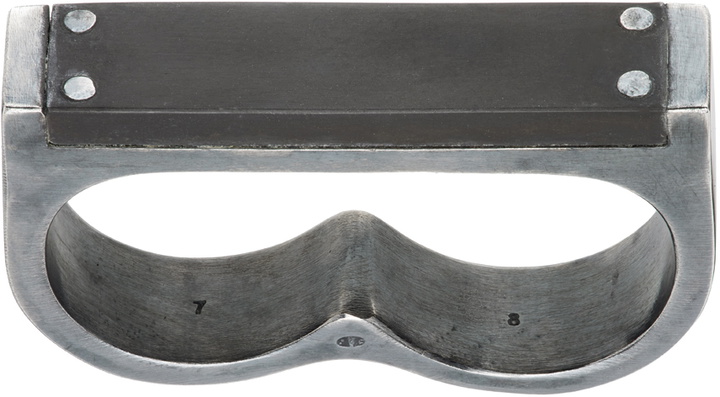 Photo: Parts of Four Black Plate Double Ring