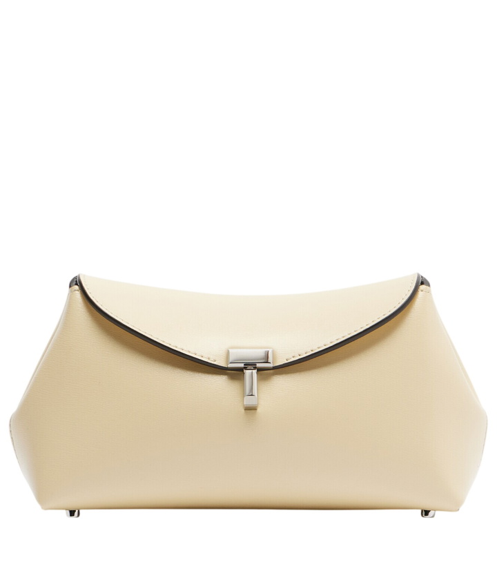Photo: Toteme T-Lock Mini leather clutch