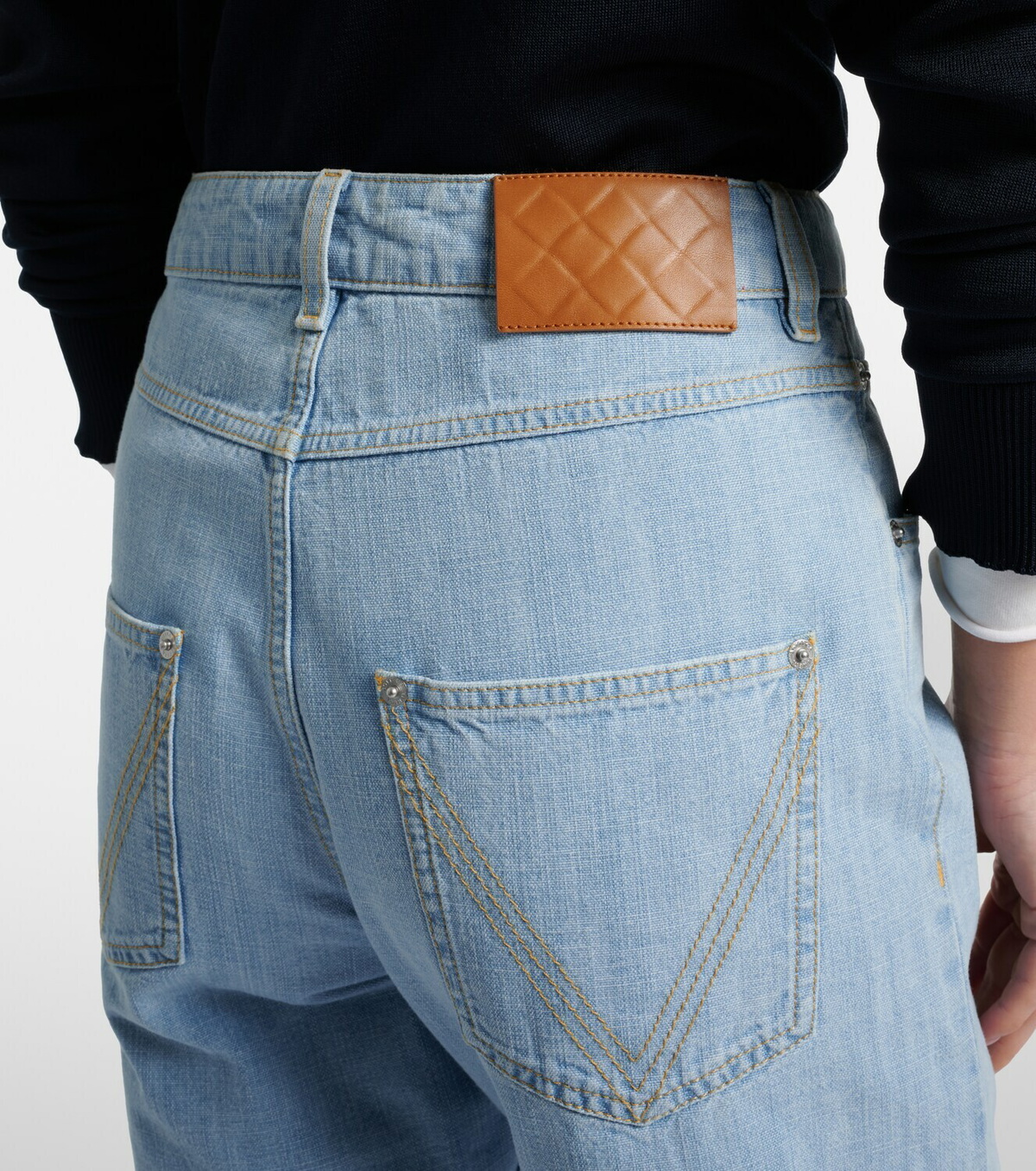 Bottega Veneta Intrecciato leather-trimmed straight jeans