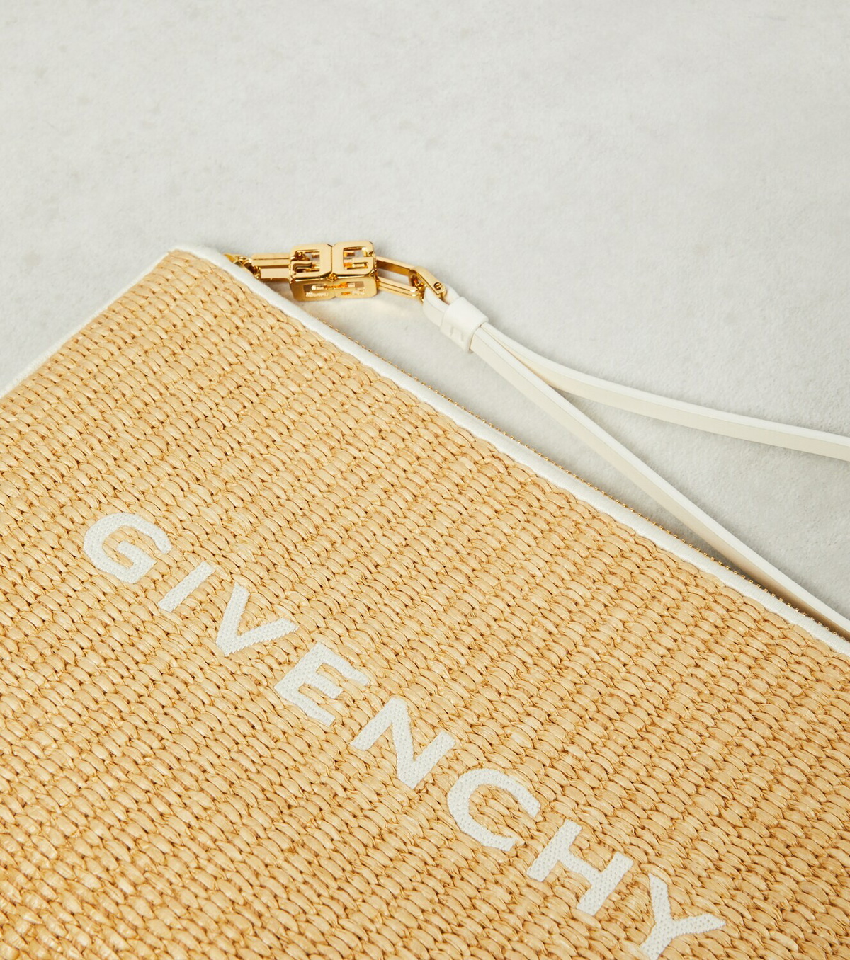 Givenchy Logo raffia clutch Givenchy