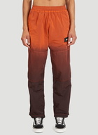 Spray-Dyed Windcheater Pants in Orange