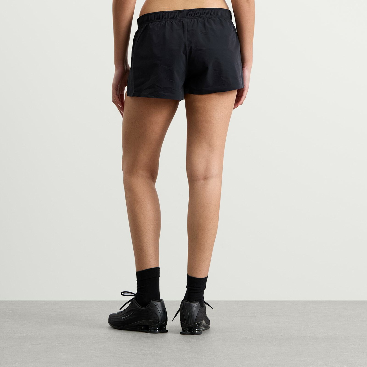 Nike Women's x SKIMS Stretch Nylon Runner Short in Obsidian