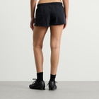 Nike Women's x SKIMS Stretch Nylon Runner Short in Obsidian