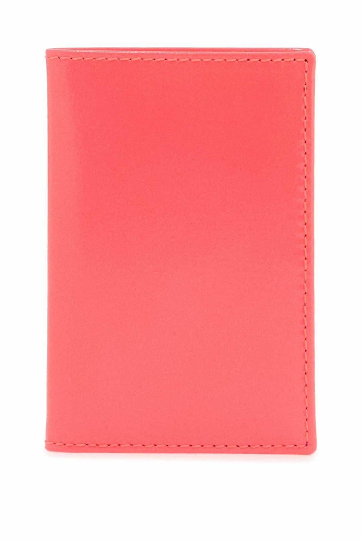 COMME DES GARCONS WALLET portafoglio compatto unisex rosa fluo in pelle di capra Pink