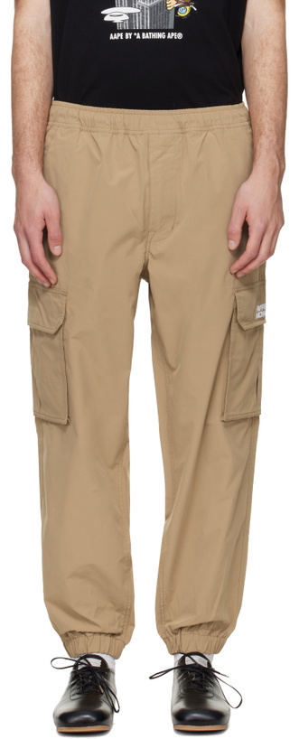 Photo: AAPE by A Bathing Ape Beige 'AAPENOW' Moonface Logo Jogger Cargo Pants