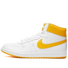 Air Jordan Nike Air Ship Sneakers in White/University Gold