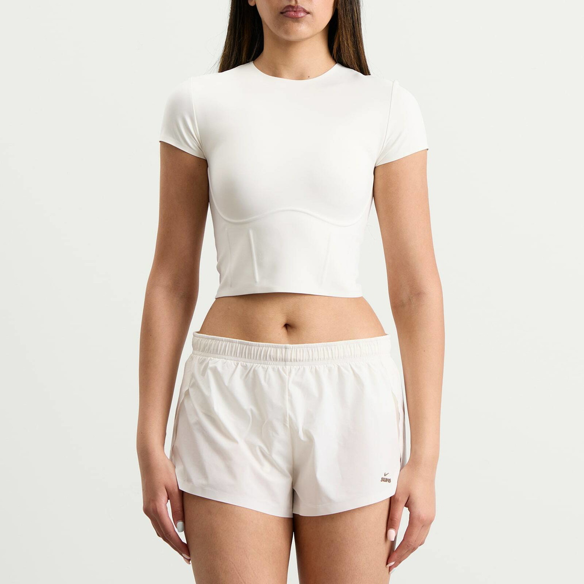 Nike Women's x SKIMS Matte Corset Short Sleeve Crop Top in Ivory