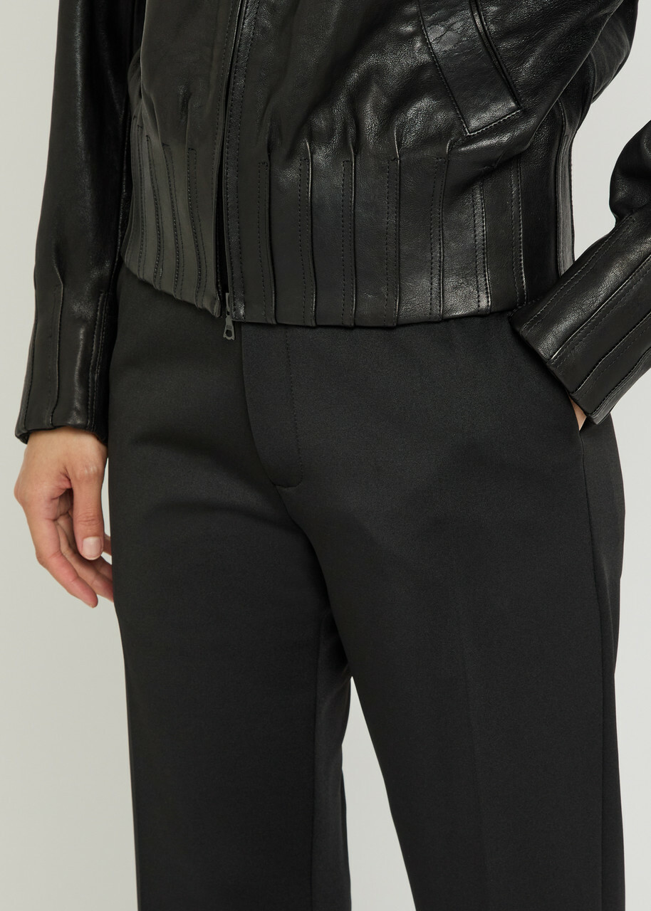 Aaron Esh Puddle Flared-leg Trousers Black