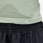 Nike Women's ACG DLTA BSLR Tank Top in Jade Horizon/Guava Ice