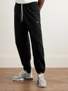 Nike - Solo Swoosh Tapered Logo-Embroidered Cotton-Blend Jersey Sweatpants - Black