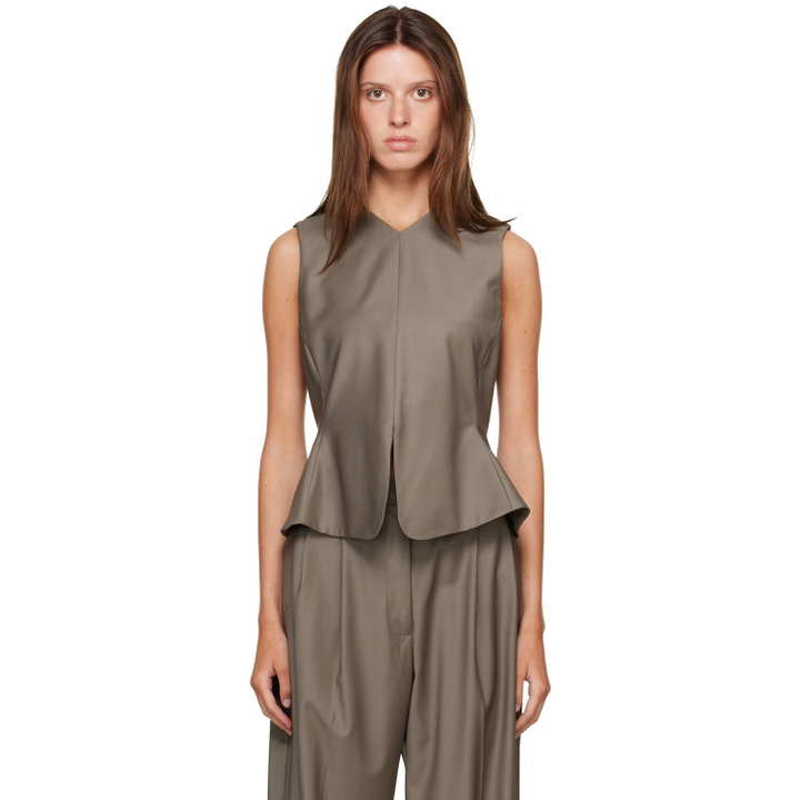 Photo: Cordera Beige Tailored Peplum Top