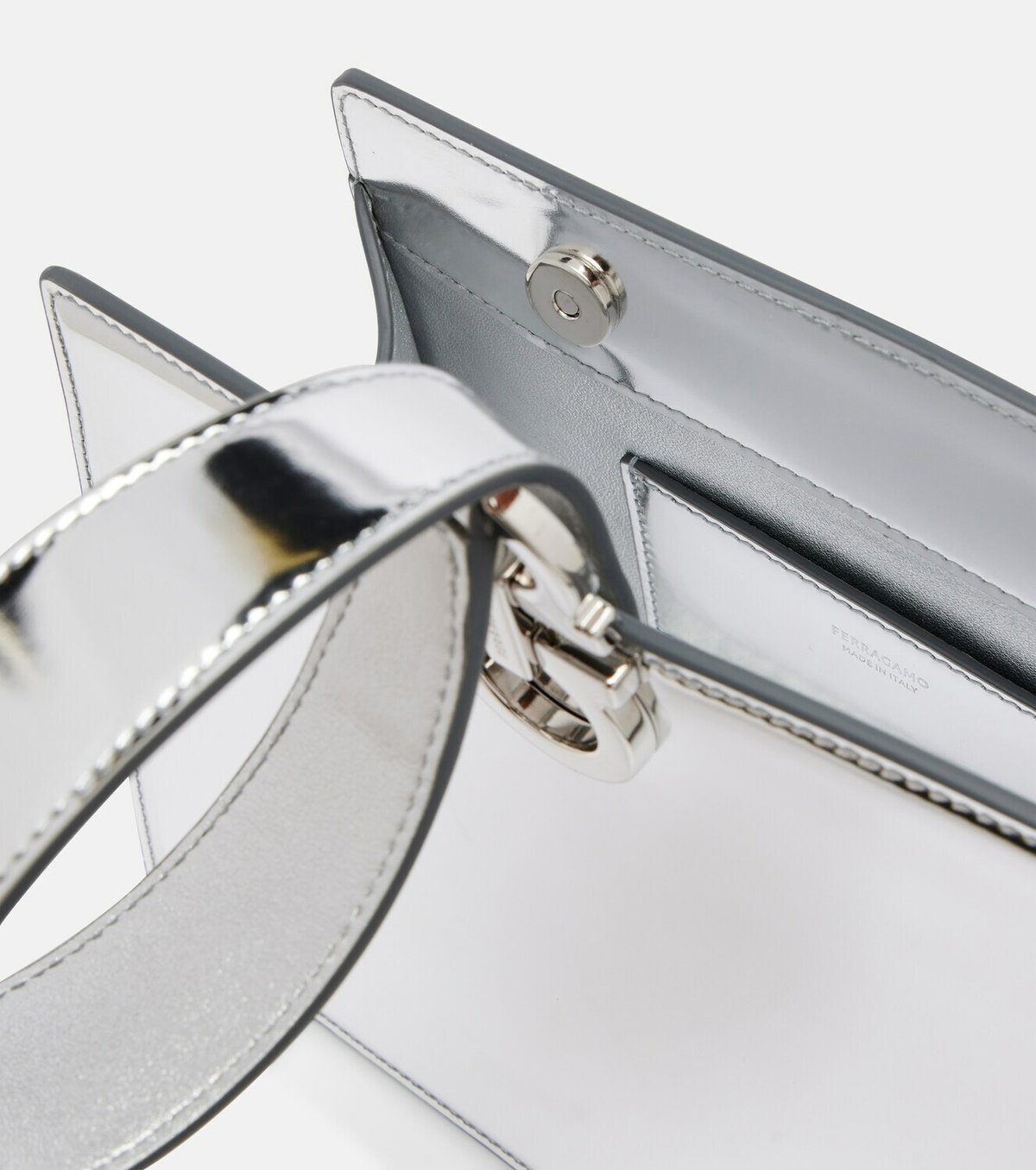 Ferragamo Gancini Small metallic leather clutch