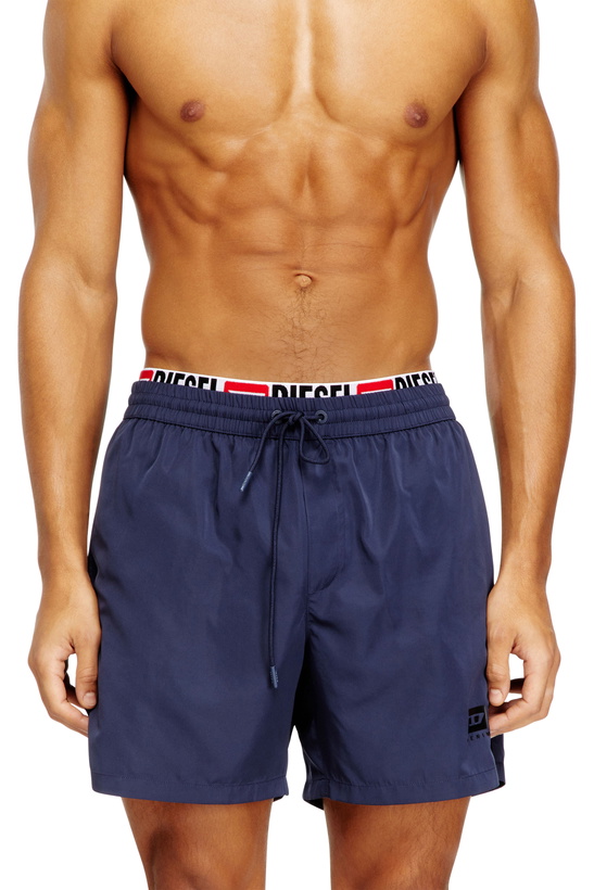 Photo: Diesel Mid-length swim shorts with logo print - Swim shorts Mens in Blue