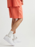 FEAR OF GOD ESSENTIALS - Wide-Leg Logo-Appliquéd Cotton-Blend Jersey Shorts - Orange