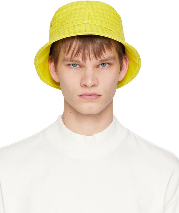 Photo: Bottega Veneta Yellow Intrecciato Bucket Hat