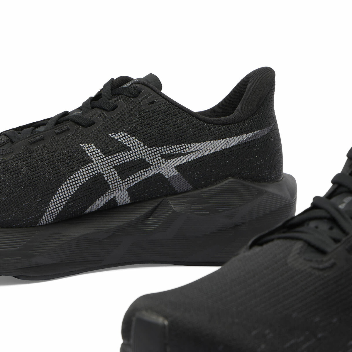 Asics Women's Novablast 6 Sneaker in Black/Black