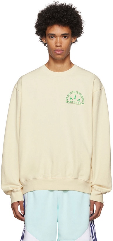 Photo: Sporty & Rich Off-White Fitness Group Sweatshirt