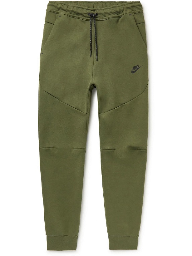 Photo: Nike - Sportswear Tapered Logo-Print Cotton-Blend Tech-Fleece Sweatpants - Green