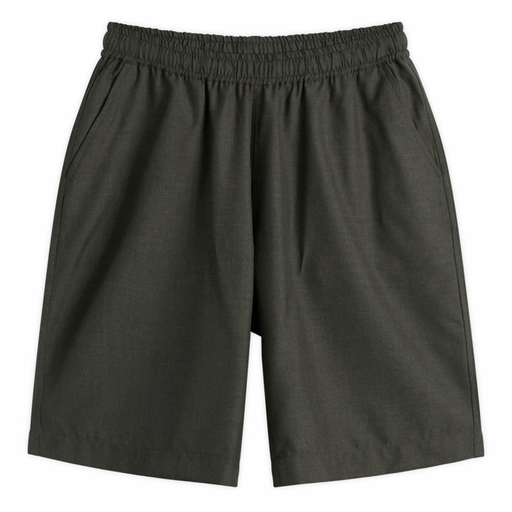 Photo: Universal Works Men's Tropical Suiting Vacation Shorts in Olive Marl