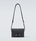 Gucci GG Supreme leather-trimmed canvas crossbody bag