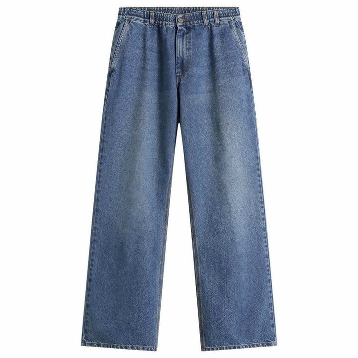 Photo: Foret Men's Clay Creased Denim Jeans in Washed Mid Blue