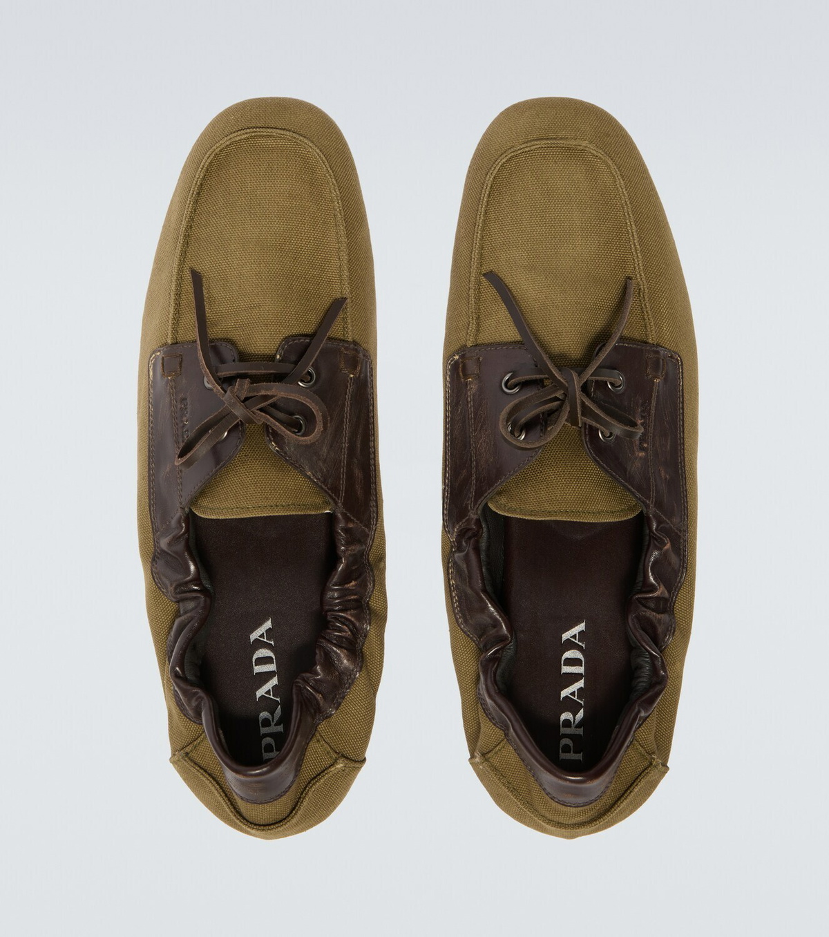 Prada Shuffle leather-trimmed canvas boat shoes