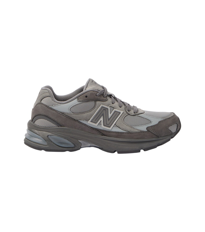 Photo: Comme des Garçons Homme x New Balance 2010 suede-trimmed sneakers