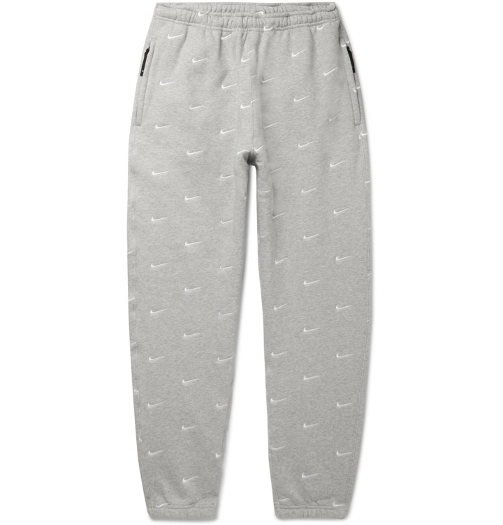 Photo: Nike - NRG Tapered Logo-Embroidered Mélange Fleece-Back Cotton-Blend Jersey Sweatpants - Gray