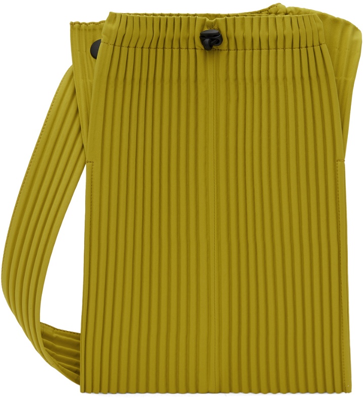 Photo: HOMME PLISSÉ ISSEY MIYAKE Yellow Pocket Bag