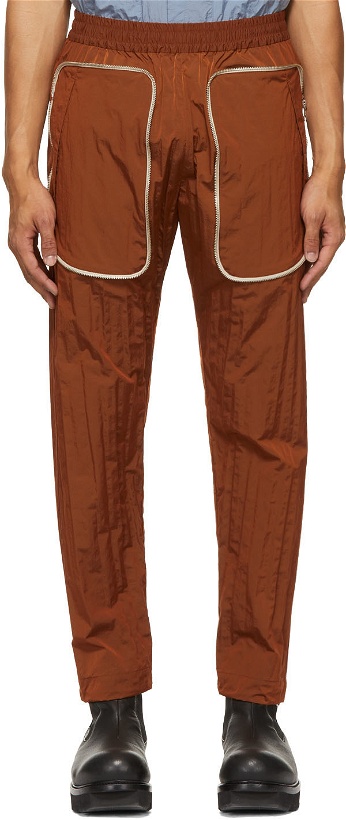 Photo: Arnar Már Jónsson Orange Zippered Pocket Track Pants