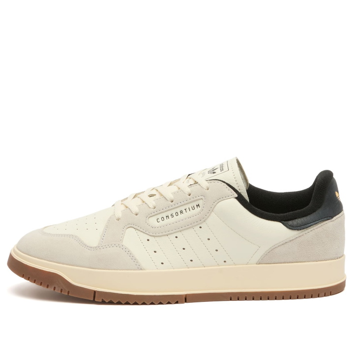 Photo: Adidas Consortium SC Powerphase Sneaker - Presented by END. in Off White/Core Black/Cream White
