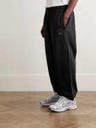 Nike - Solo Swoosh Tapered Logo-Embroidered Cotton-Blend Jersey Sweatpants - Black