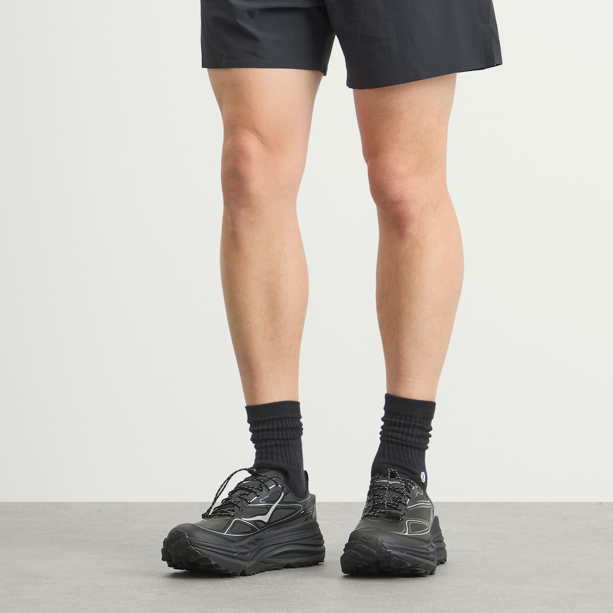 HOKA ONE ONE U Stinson One7 Sneaker in Black/Silver