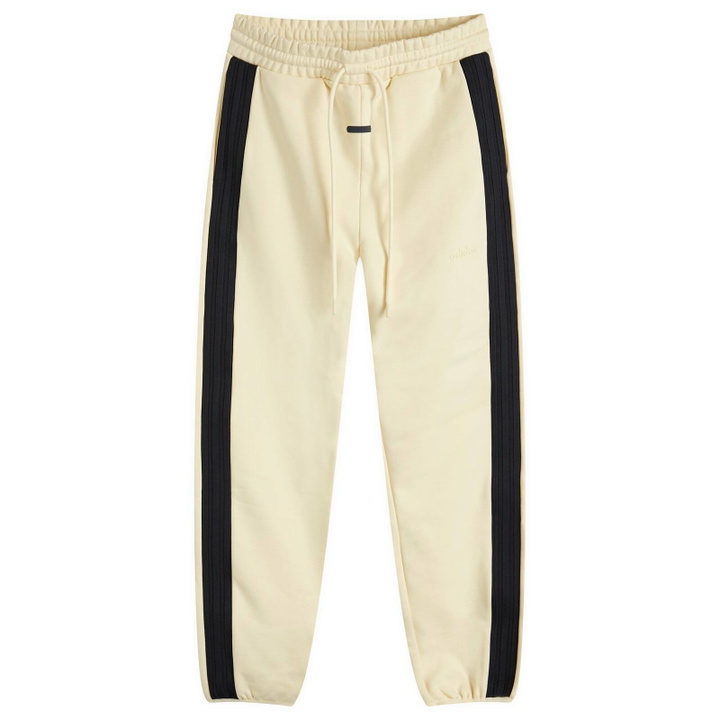 Photo: Adidas x FOG Men's Adidas x Fear Of God Athletics Fleece Slim Sweatpant in Pale Yellow/Black