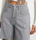 Area Distressed embellished wide-leg jeans