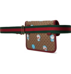 GUCCI - Doraemon Leather-Trimmed Printed Monogrammed Coated-Canvas Belt Bag - Brown