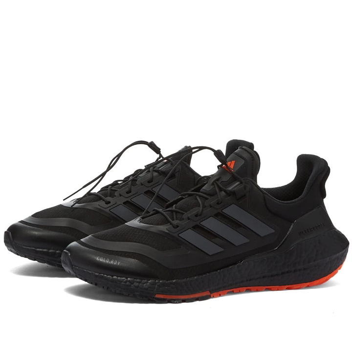 Photo: Adidas Men's Ultraboost 22 C.RDY II Sneakers in Core Black/Carbon/Orange