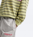 Versace Striped oversized cotton jersey polo shirt