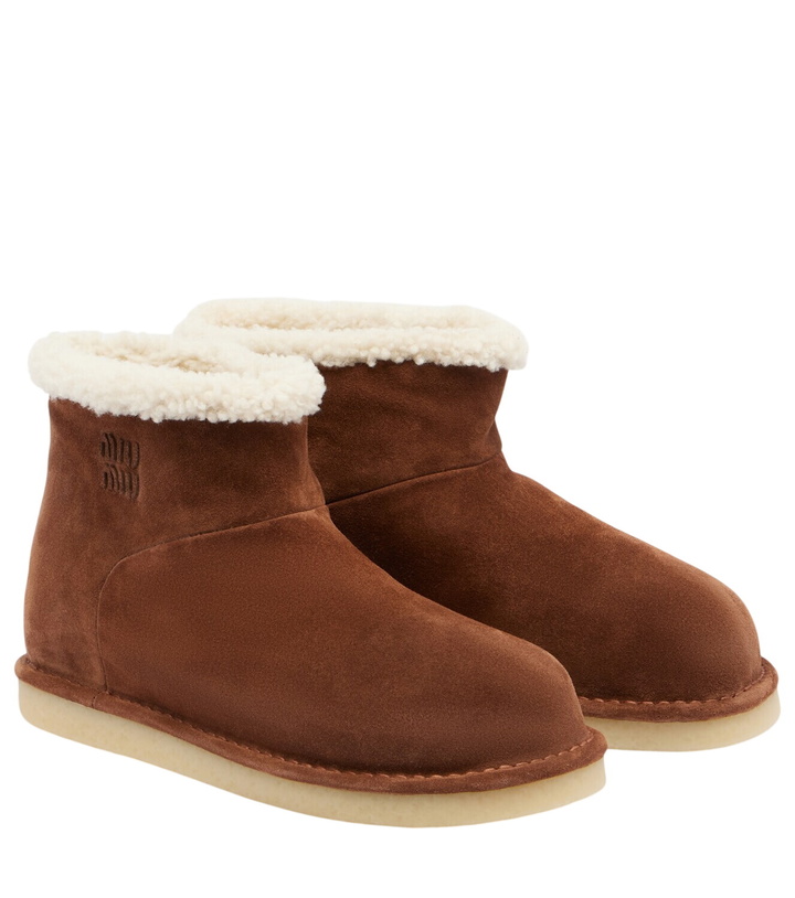 Photo: Miu Miu Shearling-lined suede ankle boots