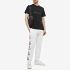 Moncler Men's Slogan Logo T-Shirt in Black