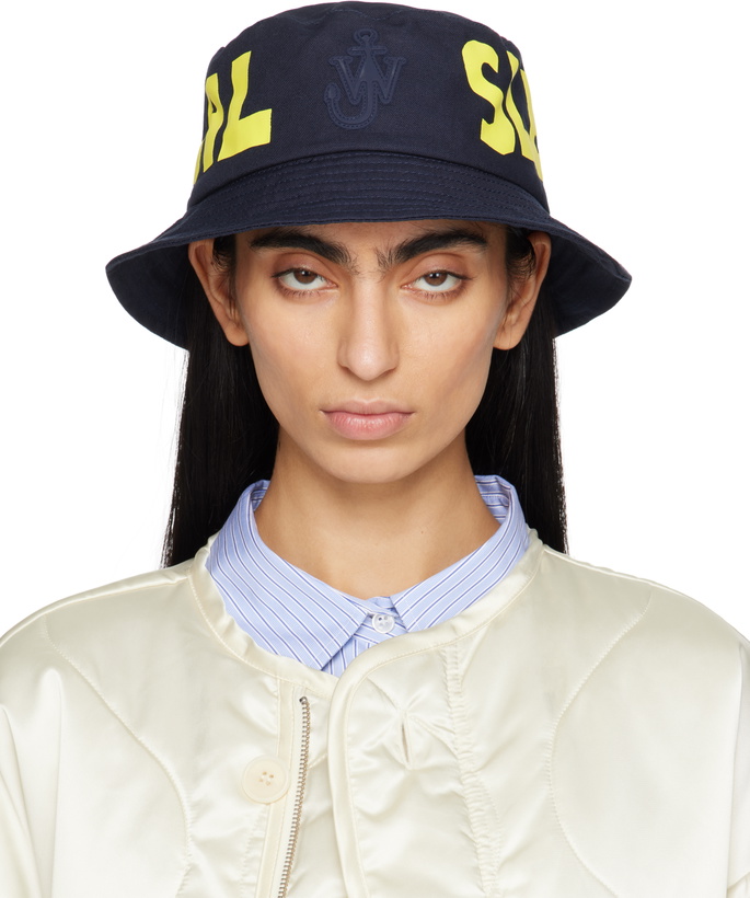 Photo: JW Anderson Navy 'Real Sleep' Slogan Bucket Hat