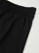 Fear of God - Tapered Logo-Appliquéd Shell Sweatpants - Black