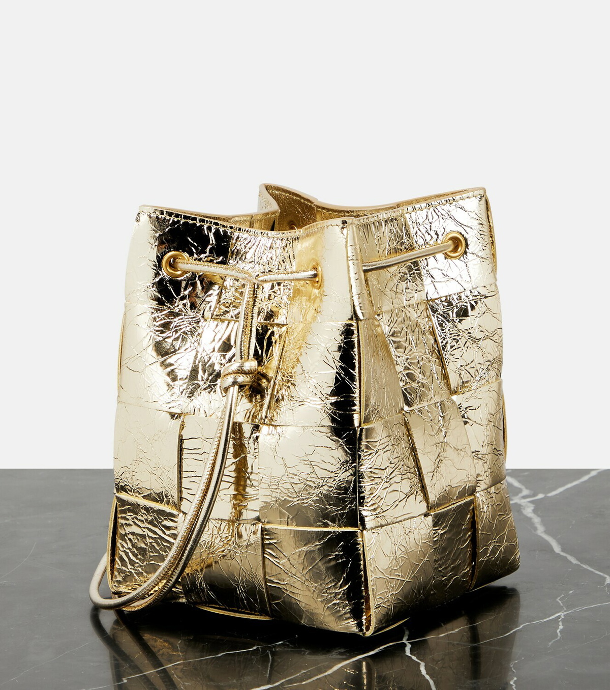 【BOTTEGA VENETA】Small Leather Cassette Bucket Bag Sunburst Bottega Veneta Small Cassette Bucket Bag in Sunburst & Gold