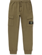 Stone Island - Tapered Logo-Appliquéd Garment-Dyed Fleece-Back Cotton-Jersey Sweatpants - Green