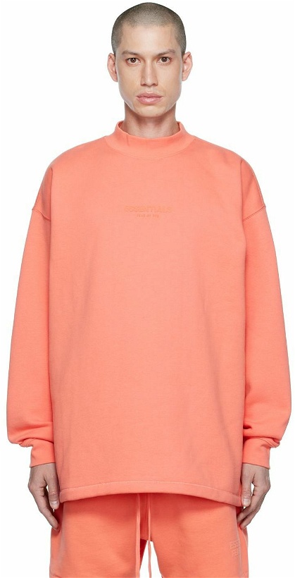 Photo: Fear of God ESSENTIALS Pink Relaxed Sweatshirt