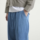 Universal Works Men's Herringbone Rec. Pleated Track Pant in Washed Indigo