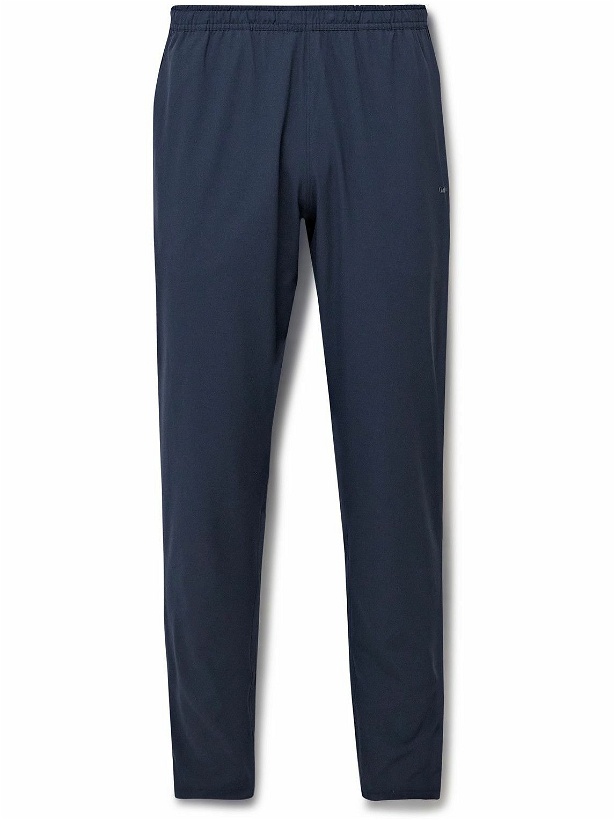 Photo: Outdoor Voices - High Stride Tapered Recycled-Shell Sweatpants - Blue