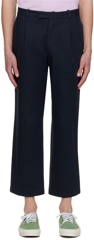 Photo: Noah Navy Pleated Trousers