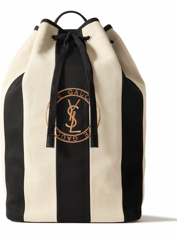 Photo: SAINT LAURENT - Logo-Embroidered Leather-Trimmed Striped Cotton-Canvas Sling Backpack